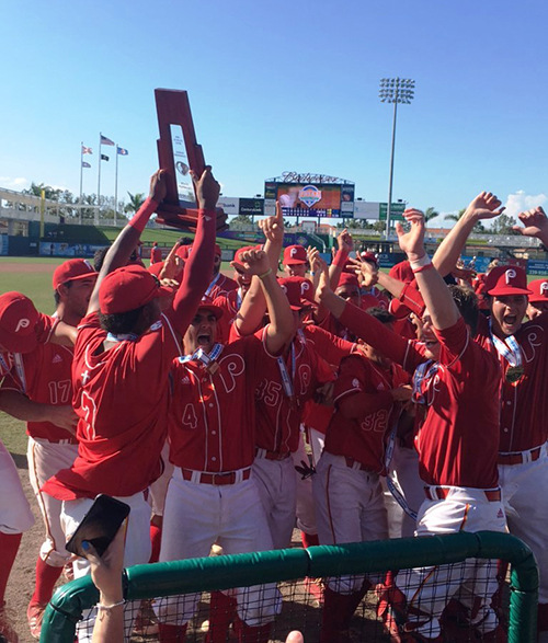 Msgr. Edward Pace High School's baseball players raise their trophy after their Class 5A state championship win over Jacksonville Bolles 10-4. It marked the school's seventh state championship, and the first since a Class 4A win in 2006.