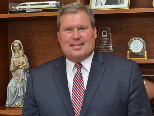 David Armstrong pauses in the president's office at St. Thomas University, where he is scheduled to start formal duties on Aug. 1.