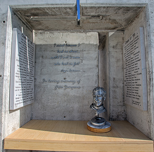 View of the grotto with Gian Zumpano's bust and reflecting cross on top wall of grotto at Belen Jesuit's new Gian Zumpano Aquatic Center.