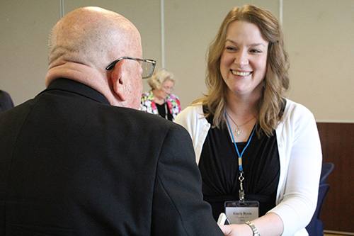 Consecrated virgin Emily Byers from Lafayette, Louisiana, shares a laugh with Archbishop Emeritus John Favalora, who was born and raised in New Orleans.