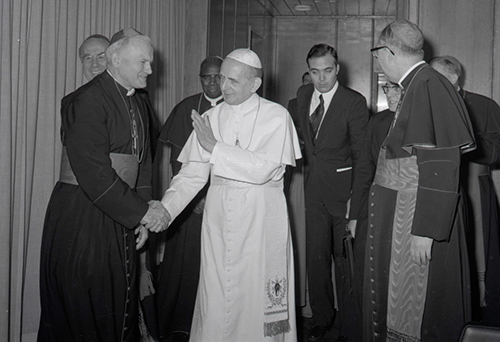 This file photo shows Blessed Pope Paul VI greeting then Cardinal Karol Wojtyla, the future Pope John Paul II, who participated in his predecessor's contraception study commission, praised the encyclical in a 1969 letter to the pope, and later expanded on those teachings in his own encyclical, Evangelium Vitae, and his reflections on human sexuality, gathered and known now as the Theology of the Body.
