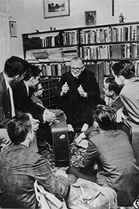 Msgr. Bryan Walsh speaks with some of his Pedro Pan kids in this file photo.