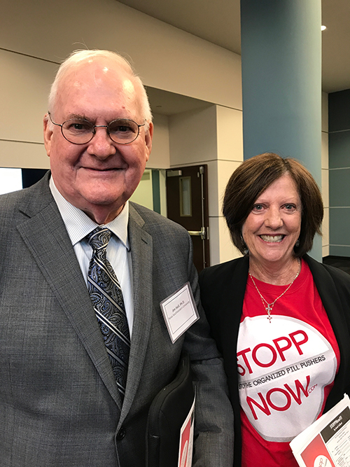 Nationally renowned epidemiologist Jim Hall poses with opioid activist and STOPPNow author Janet Colbert during the Broward County Opioid Epidemic Town Hall Meeting in August 2017.