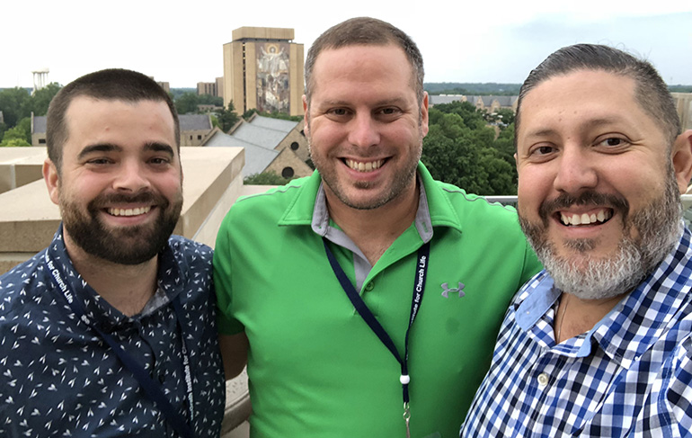 Eric Beltran, right, poses with two other faculty from Immaculata-LaSalle High School at Notre Dame University, where they attended seminars in science and religion this summer. From left are Nicholas Shaheen and Michael Pena.