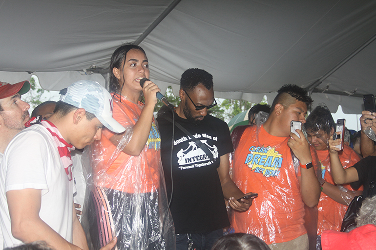 Young "dreamers" and activists speak in favor of the Deferred Action for Childhood Arrivals (DACA), after a protest march in Homestead in June of this year. The marchers were protesting the "zero tolerance" policy of separating families at the border in front of the U.S. government's emergency shelter for unaccompanied minors.