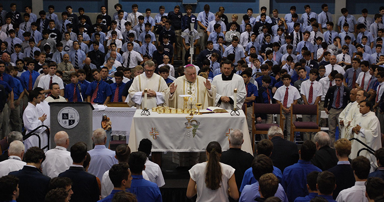 Archbishop Thomas Wenski celebrates an all-school Mass Aug. 30 marking the start of the 60th school year at the Marist Brothers' Christopher Columbus High School in Miami.