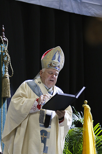 Archbishop Thomas Wenski delivers remarks at the conclusion of the 2018 Mass for the feast of Our Lady of Charity. He alluded to the scandal of sexual abuse still plaguing the Church, and the "acts of commission or omission" of Church leaders.