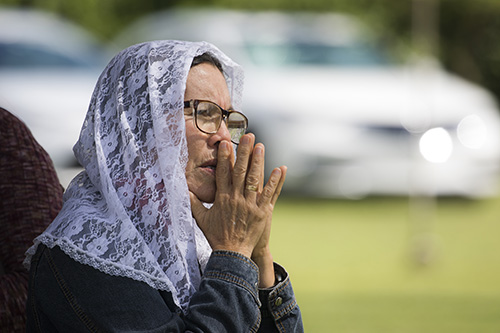Arinda Moreno, a member of the Schoenstatt Apostolic Movement, prays during the Mass commemorating the 50th anniversary of the death of Father Joseph Kentenich.