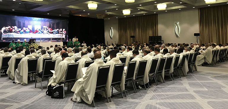 Archdiocesan priests join Archbishop Thomas Wenski and his auxiliary bishops for morning Mass and prayer Sept. 19, the second day of the annual clergy convocation being held at the Hilton Miami Downtown. The event, scheduled to conclude Sept. 20, included guest speakers, workshops and opportunities for spiritual and fraternal renewal among local clergy.