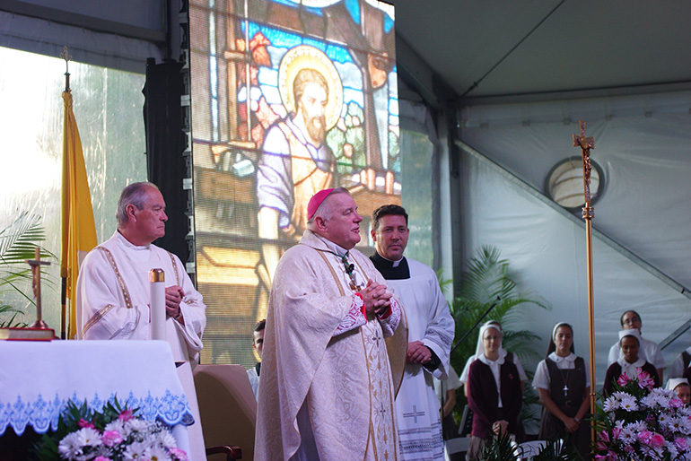 Archbishop Thomas Wenski celebrates the annual Mass on the feast of Our Lady of Mercy, Sept. 24, on the grounds of Mercy Hospital in Miami. The Mass was celebrated in a large tent on the shores of Biscayne Bay, on the northwest corner of Mercy's campus. Servants of the Pierced Hearts of Jesus and Mary formed the choir. Priest chaplains at Mercy Hospital, Father Sterling Laurent and Father Carlos Cabrera, along with Trinitarian Father Adelson Moreira, chaplain at nearby Immaculata-La Salle High School, concelebrated with Archbishop Wenski.