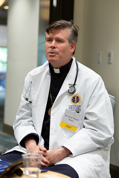 Father Scott Francis Binet is a consecrated religious in perpetual vows with the Order of St. Camillus and a diplomate of the American Board of Family Medicine. He ministers at the Miami Rescue Mission, goes on foreign mission trips and served as founding president of the Miami guild of the Catholic Medical Association.