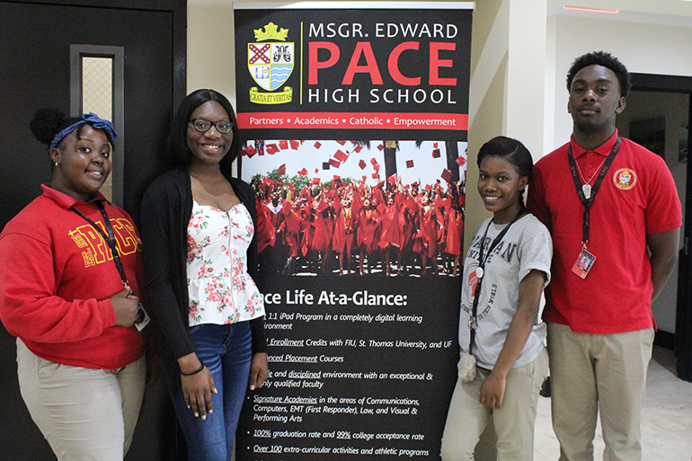 Curley Knights become Pace Spartans: One year after Archbishop Curley Notre Dame High closed its doors, its students who transferred to Msgr. Edward Pace High feel at home. From left: Christie Corolian, Tajmara Antoine, Saskia Magloure and Justane Pierre.