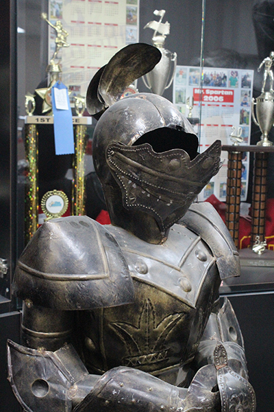 A Curley Knight mascot that once stood in Archbishop Curley Notre Dame High now stands among Msgr. Edward Pace High memorabilia.