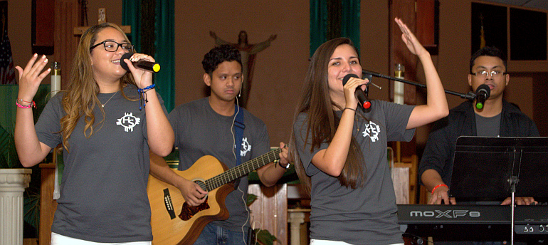 Serina Cotto, left, and Marcella Osorio sing, with Gerard Calilung on guitar and Jonathan Gaus on keyboard.