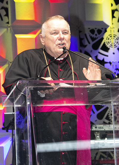 Archbishop Thomas Wenski addresses attendees at the archdiocese's 60th anniversary gala. Those who have children in college can appreciate the cost, he said, adding that he has 58 seminarians in various stages of formation at the three Florida seminaries: St. John Vianney College Seminary, St. Vincent de Paul Regional Seminary in Boynton Beach, and Redemptoris Mater Seminary in Hialeah.