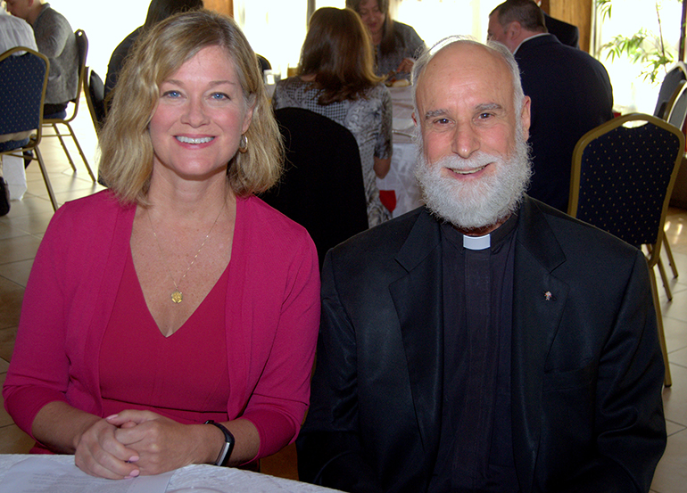 Jeanne Mancini, president of the national March for Life group, sits with bioethicist Father Alfred Cioffi at a brunch cosponsored by the archdiocesan Respect Life Office and the Cuban Association of the Sovereign Order of Malta.