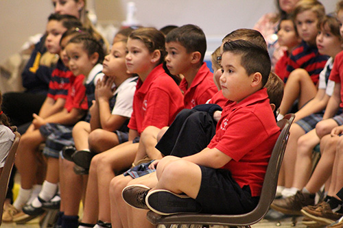 St. Mark students listen attentively during author Sarah Mlynowski's presentation.