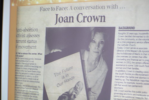 PowerPoint depicts an early newspaper article featuring Joan Crown’s pro-life work.