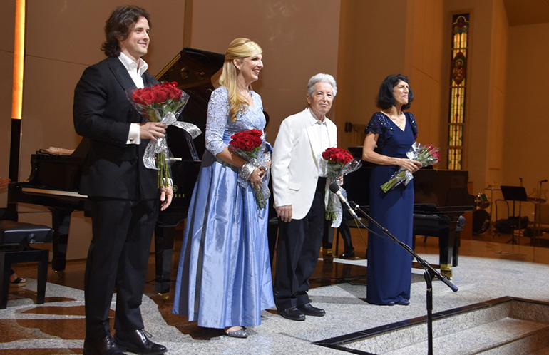 From left: tenor Matthew Maness, soprano Giselle Elgarresta Rios, pianist Paul Posnak and Anita Castiglione take their bows at end of Martha/Mary Concerts presentation of Gershwin and Bernstein works at Corpus Christi Church Nov. 4.
