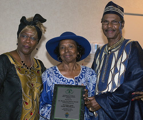 Katrenia Reeves Jackman, director of the Office of Black Catholic Ministry, poses with Lona and Jerome Matthews of St. Philip Neri Church in Miami Gardens, who received one of this year's St. Martin de Porres awards. The archdiocesan Office of Black Catholic Ministry celebrated Black Catholic History Month by presenting its annual St. Martin de Porres awards to exemplary members of the community. The awards were presented during a luncheon Nov. 17 in Miami Gardens.