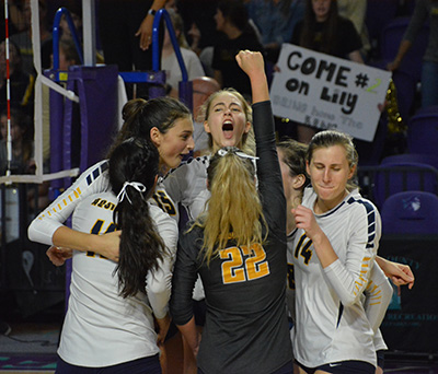 St. Thomas Aquinas volleyball players celebrate their sixth state championship after the beating Tampa Plant Nov. 17 in Fort Myers.