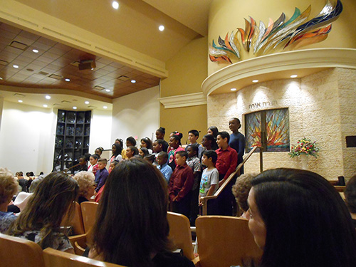 The children's choir from St. Andrew Catholic Church, directed by Mary Lou Taff, perform "Para Amar Como Tu" (To Love Like You), at the 2018 Interfaith Unity Service which took place a couple of days before Thanksgiving in Coral Springs.