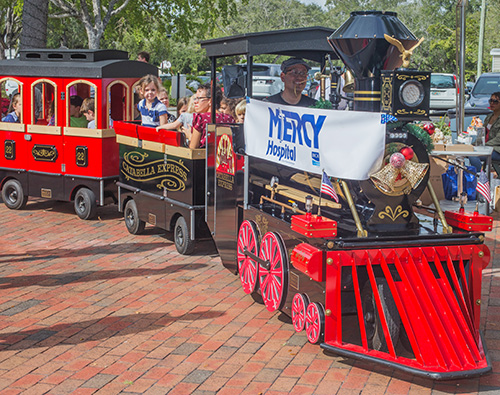 As part of the festivities on Welcome Weekend Dec. 8-9, St. Hugh parishioners and visitors get to ride Mercy Hospital's Mercy Train.