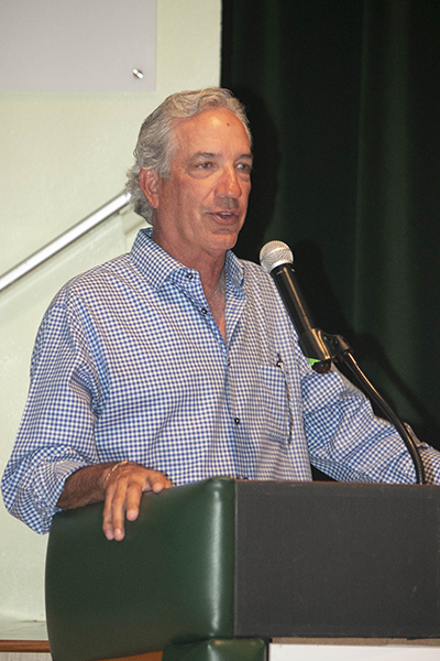 Jorge Guarch, Jr., son of the "George" who greeted all the Pedro Pan arrivals at the airport and kept meticulous records of their names, birth dates and where they were housed, speaks before the showing of "Operation Pedro Pan: The Cuban Children's Exodus," at his alma mater, Immaculata-La Salle High School in Miami.