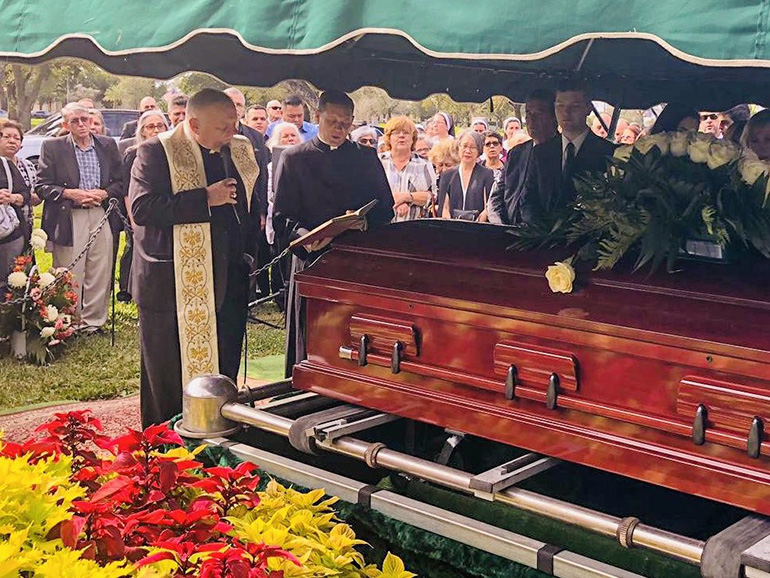 Archbishop Thomas Wenski prays before giving Christian burial to Msgr. Tomás Marín, former archdiocesan chancellor and most recently pastor of St. Augustine Parish in Coral Gables. Msgr. Marín died Dec. 28, 2018. Hundreds of friends, fellow priests and former parishioners filled Our Lady of Guadalupe Church in Doral, where Msgr. Marin served for nine years as founding pastor, for the funeral Mass. Burial was next door, at Our Lady of Mercy Cemetery.