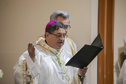 Auxiliary Bishop Enrique Delgado celebrated the Mass marking the start of a year-long celebration of St. Henry Church's golden jubilee.