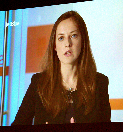 Kristina Anderson, a survivor of the 2007 shootings at Virginia Tech, speaks via video during a session on coping with active shooter situations at Cardinal Gibbons High School.