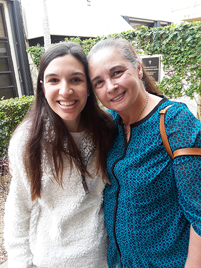 While training to become a Guardian ad Litem at St. John Neumann Parish, attorney Veronica Guerra, left, reconnected with her former religious education teacher, Rosy Schwindeman, wife of Eric Schwindeman, who spearheaded the creation of the Hope, Heart & Home ministry at the parish.