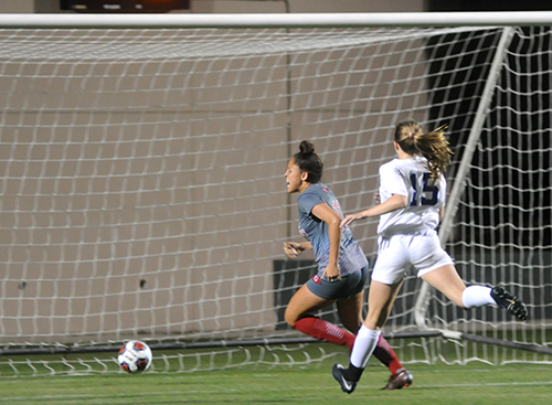 Cardinal Gibbons defender Maya Alicea scores a goal past Bolles defender Caitlyn Boyer during the first half Wednesday, Feb. 20, 2019. Bolles defeated Cardinal Gibbons 5-1 at Spec Martin Stadium in DeLand. Alicea, a University of South Florida signee, finished with 19 goals and 17 assists. It was Cardinal Gibbons' first state final since 2009.