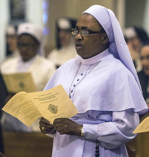 Sister Marygracious Onwukwe, marking 25 years with the Daughters of Mary, Mother of Mercy, takes part in the Mass for the World Day of Consecrated Life.