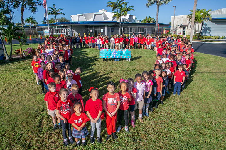 The students of St. Ambrose School in Deerfield Beach formed a heart to show their love to the fallen victims of the Marjory Stoneman Douglas tragedy. They also held a short prayer service Feb. 14, the anniversary of the tragedy.