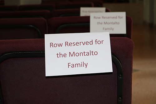 Seats at Mary Help of Christians bear the names of the Montalto family. Nearly 30 members of the family attended a holy hour at 2 p.m. Feb. 14, the one-year-anniversary of the Parkland school shooting where Gina Montalto, 14, was killed. She was in ninth grade at Marjory Stoneman Douglas High School.