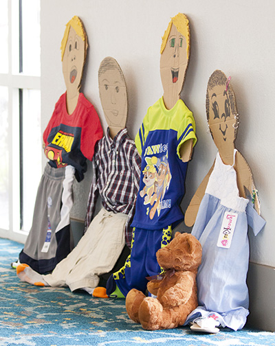 On display at the Miami Archdiocesan Council of Catholic Women's 2017 convention were dozens of children's clothes which had been donated for needy children.