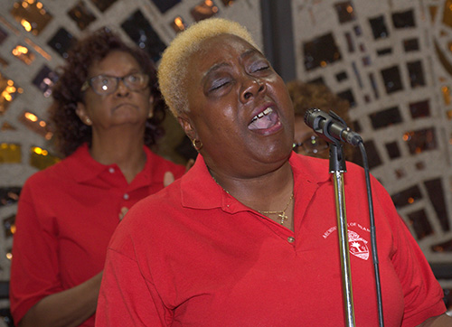 Dale DeShazior sings as a lead soloist for a song during a revival at St. Bernard Church, presented by the archdiocesan Office of Black Catholics.
