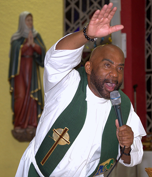 Guest preacher Father Roy Lee of Atlanta speaks during a revival at St. Bernard Church presented by the archdiocesan Office of Black Catholics.