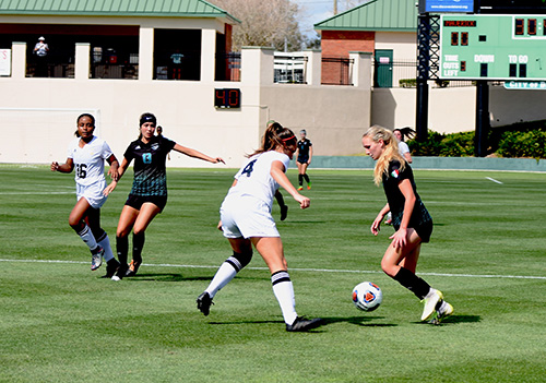 Archbishop McCarthy's Lady Mavericks battle Montverde Academy players during the Class 4A state championship final Feb. 22 in DeLand. Both Montverde (#2) and McCarthy (#6) were nationally ranked and undefeated teams.