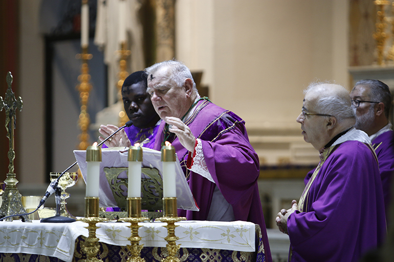 Archbishop Thomas Wenski celebrates Ash Wednesday Mass at Gesu Church in downtown Miami, March 6, 2019.