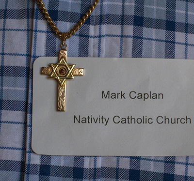 The cross bearing the star of David medal which Mark Caplan wears around his neck.