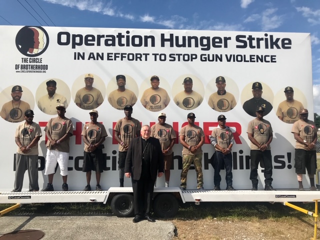 Archbishop Thomas Wenski on March 24 visited the site of Operation Hunger Strike, a protest against gun violence in urban communities staged by nine men affiliated with a group called The Circle of Brotherhood. The men ended their strike March 29, saying the news and social media attention had made a difference.