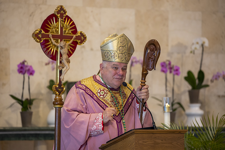 Archbishop Thomas Wenski gives the homily during the Mass celebrating the 60th anniversary of St. Pius X Church in Fort Lauderdale.