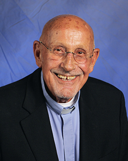 Father Roger Holoubek, marking 50 years of ordination.