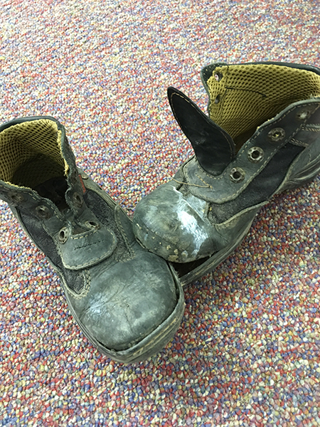During her two-week stay at the Casa Oscar Romero shelter in El Paso, Texas, volunteer Silvia Muñoz took a picture of the shoes of a child who walked to the U.S. border from Central America with his parents.