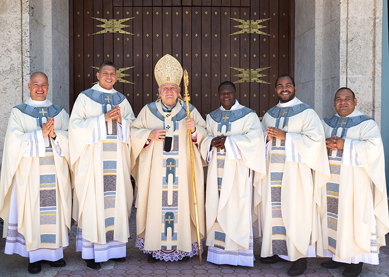 Archbishop Thomas Wenski poses with the newly ordained priests, from left: Father Elkin Sierra, Father Yonhatan A. Londoño, Father Reynold Brevil, Father Jose Enrique Lopez and Father Martin Munoz. At a standing-room only St. Mary Cathedral, nearly 1,000 people witnessed the joyous, tradition-filled Mass of ordination for five new priests for the Archdiocese of Miami, May 11, 2019.