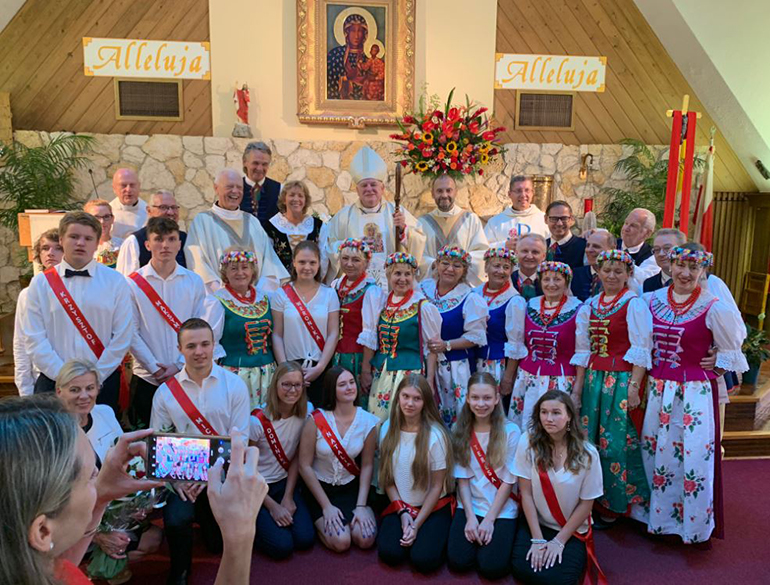 Archbishop Thomas Wenski poses with the 2019 confirmation class at Our Lady of Czestochowa Polish Mission in Pompano Beach, along with their catechists and pastor. The archbishop presided at the confirmation Mass May 19.