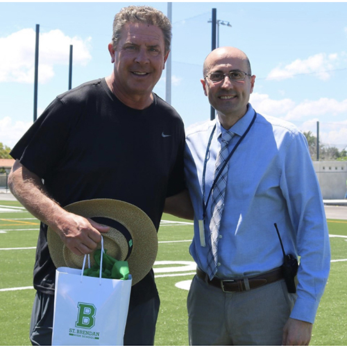 Miami Dolphins' legendary quarterback and NFL Hall of Famer Dan Marino stopped by St. Brendan High School May 21 to check out the new football and baseball fields. Marino is pictured here with St. Brendan's principal, Jose Rodelgo-Bueno.