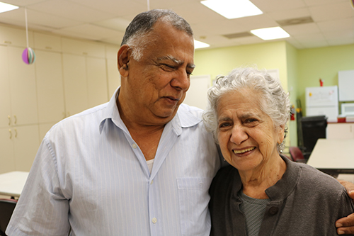 William Rojas and his mother Ruth Vidal, 85, arrive at Davie's Centro Oeste Adult Day Care Center early. Vidal brings his mother to the center during the week while he is working. He says the center is a great help to him and to his mother. He has seen her personality blossom. "She can't be left alone," he said about his mother, who suffers from Alzheimer's.